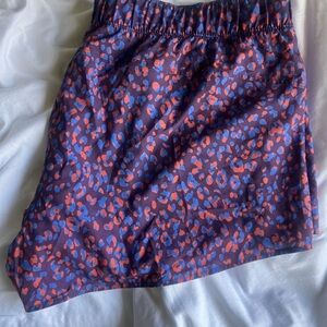 Mid rise stretch tech run short